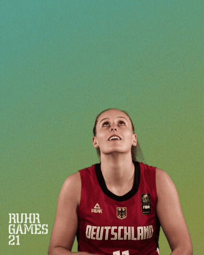 A Female Basketball Player With The Number 11 On Her Jersey Shoots The Ball GIF
