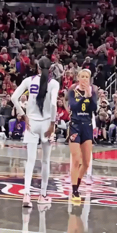 A Female Basketball Player With The Number 8 On Her Shorts GIF