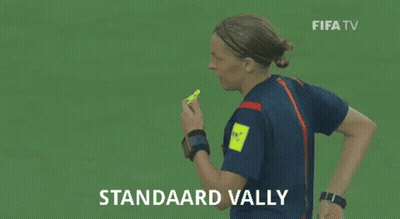 A Female Referee Is Giving A Red Card To A Soccer Player On A Soccer Field . GIF