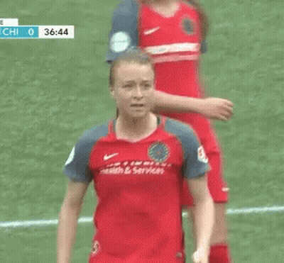 A Female Soccer Player Wearing A Providence Health & Services Jersey GIF
