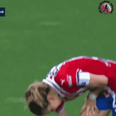 A Female Soccer Player Wearing A Red And White Striped Jersey With Coca Cola On The Sleeves GIF