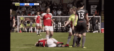 A Female Soccer Player With The Number 13 On Her Jersey GIF