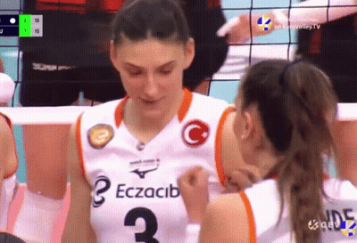 A Female Volleyball Player Wearing A Number 3 Jersey GIF