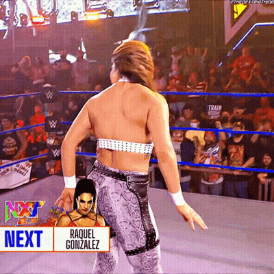 A Female Wrestler Named Raquel Gonzalez Is Dancing In A Ring GIF