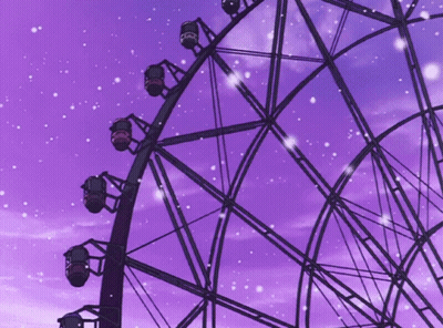 A Ferris Wheel With A Purple Sky Behind It GIF