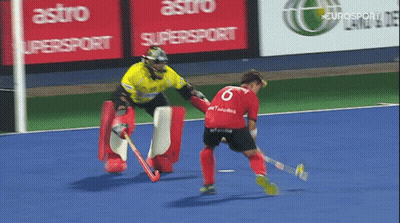 A Field Hockey Game Is Being Played In Front Of An Astro Supersport Sign GIF