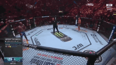 A Fighter In A Ufc Ring With A Monster Energy Logo On The Floor GIF