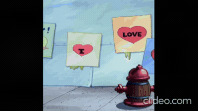 A Fire Hydrant Is Standing In Front Of A Wall With Signs That Say Love And I Love You GIF