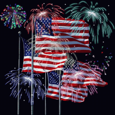 A Fireworks Display With American Flags In The Background GIF