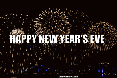 A Fireworks Display With The Words Happy New Year 'S Eve Below It GIF