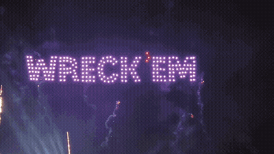 A Fireworks Display With The Words Wreck Em Fc Written In Lights GIF