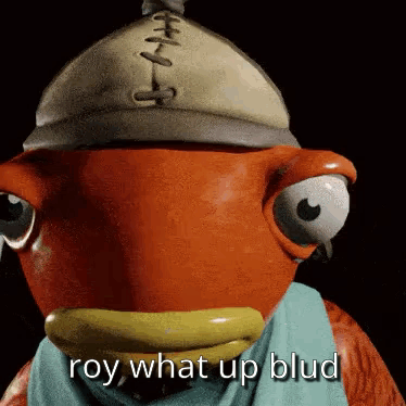 A Fish Wearing A Hat And Scarf With The Words `` Roy What Up Blud '' Written On It . GIF