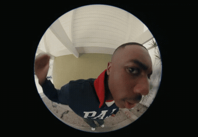 A Fisheye View Of A Man Wearing A Sweatshirt That Says Da GIF