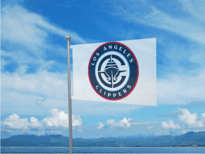 A Flag That Says Los Angeles Clippers Is Flying In The Wind GIF
