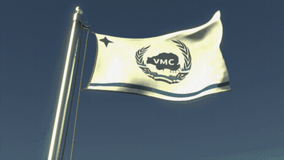 A Flag That Says Vmc Is Flying In The Wind GIF