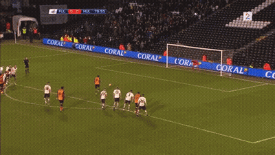 a flamingo soccer player celebrates a goal during a game