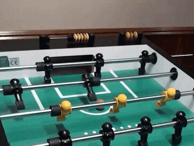 A Foosball Table With A Ce Sticker On The Side GIF