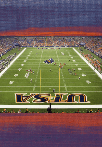 A Football Field With The Word Ucla On The Field GIF