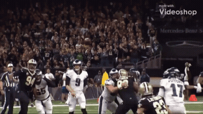 A Football Game Being Played In Front Of A Mercedes Benz Sign GIF