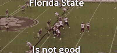 A Football Game Between Florida State And Alabama GIF