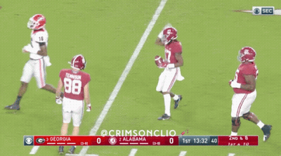 A Football Game Between Georgia And Alabama Is Being Played GIF