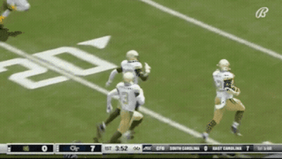 A Football Game Between Georgia Tech And Boston GIF