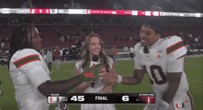 A Football Game Between Miami And Stanford Is Being Played GIF