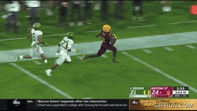 A Football Game Between Oregon And Arizona Is Being Played GIF
