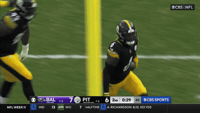 A Football Game Between Pittsburgh And Baltimore GIF