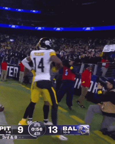 A Football Game Between Pittsburgh And Baltimore Is In Progress GIF