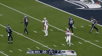 A Football Game Between Seahawks And Patriots GIF