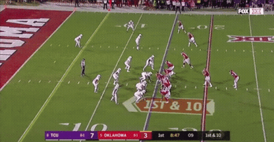 A Football Game Between Tcu And Oklahoma Is Being Shown On Fox GIF