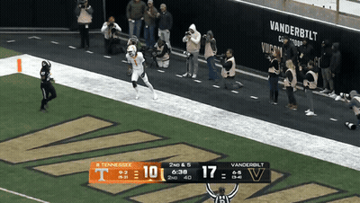 A Football Game Between Tennessee And Vanderbilt With A Score Of 17 To 17 GIF