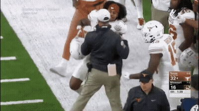 A Football Game Between Texas And Missouri Is Going On GIF