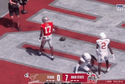 A Football Game Between Texas And Ohio State Is On Fox GIF