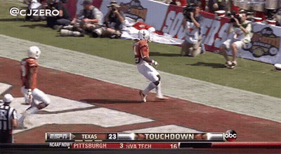 A Football Game Between Texas And Pittsburgh GIF