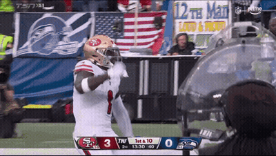 A Football Game Between The 49Ers And Seahawks GIF