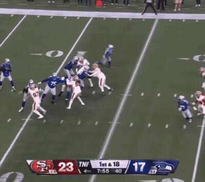 A Football Game Between The 49Ers And The Seahawks GIF