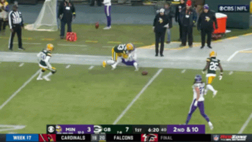 A Football Game Between The Cardinals And The Vikings GIF