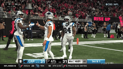 A Football Game Between The Carolina Panthers And The Atlanta Falcons Is Being Shown On Cbs GIF