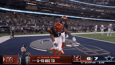 A Football Game Between The Cincinnati Bengals And The Cowboys GIF