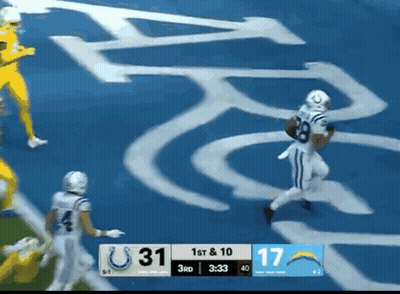 A Football Game Between The Colts And The Chargers Is Being Played GIF