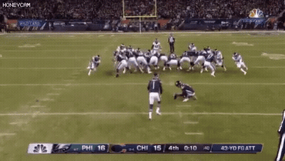 A Football Game Between The Eagles And The Ravens GIF