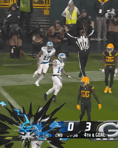 A Football Game Between The Green Bay Packers And The Detroit Lions Is In Progress GIF
