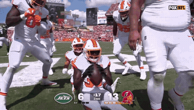 A Football Game Between The Jets And The Buccaneers Is Being Shown On Fox Nfl GIF