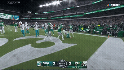 A Football Game Between The Jets And The Falcons GIF
