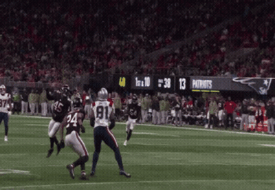 A Football Game Between The Patriots And The Ravens Is Going On GIF