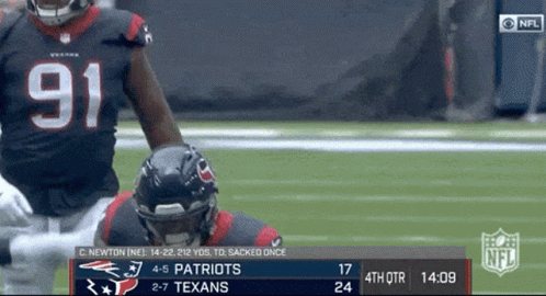 A Football Game Between The Patriots And The Texans Is Being Played GIF