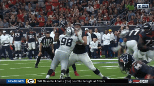 A Football Game Between The Raiders And The Texans Is Being Shown On Cbs GIF
