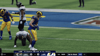 A Football Game Between The Rams And The Jets GIF